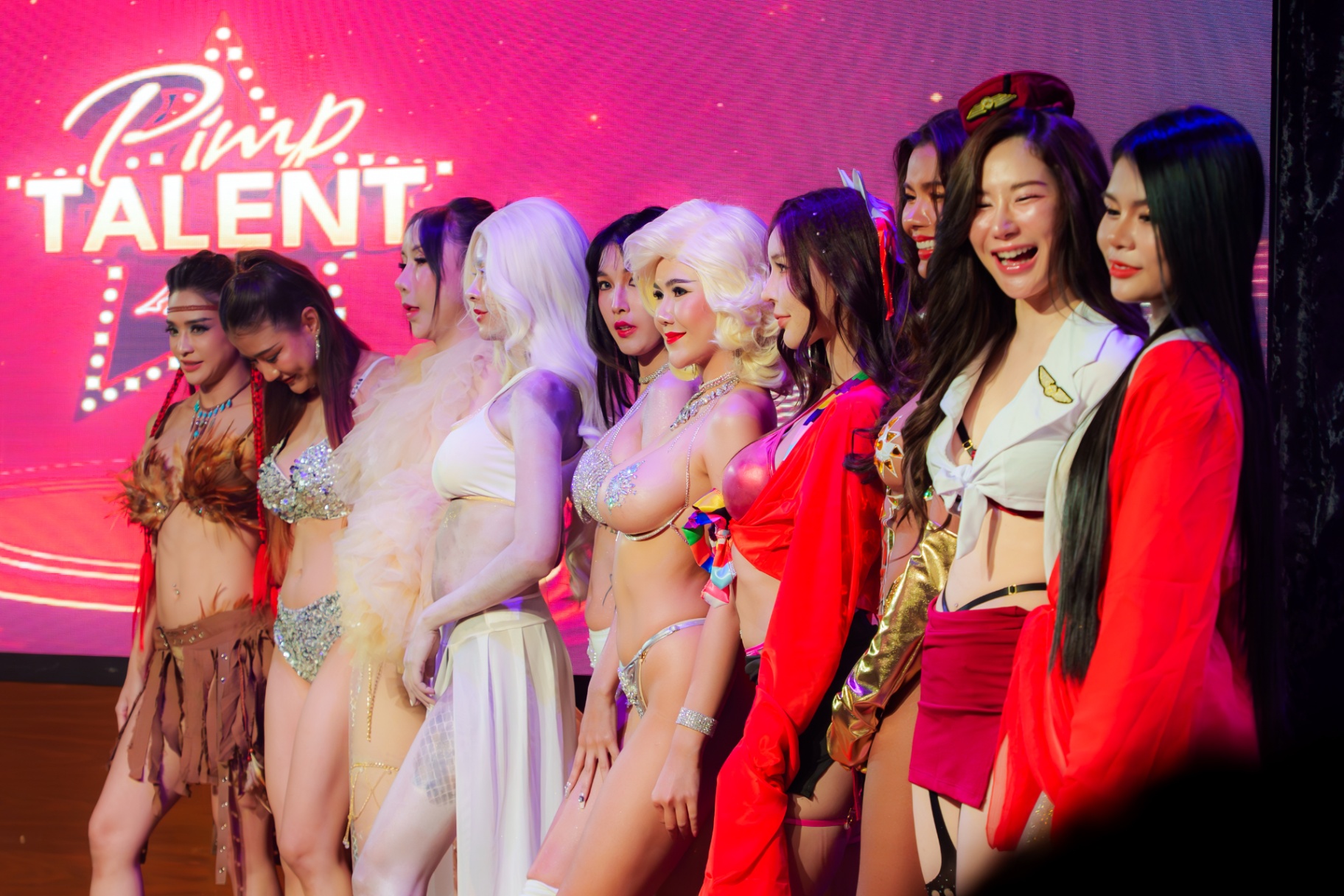 Live lineup of contestants on stage during the event